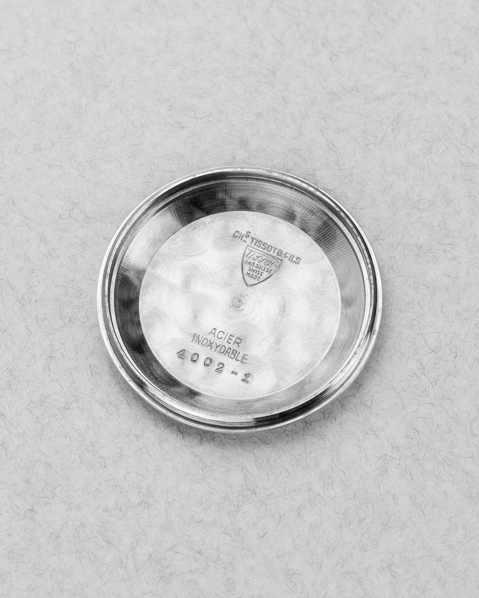 58TV Rare Tissot Navigator World Time réf. 4002-1 en acier de 1951 – Première génération - Inside case back