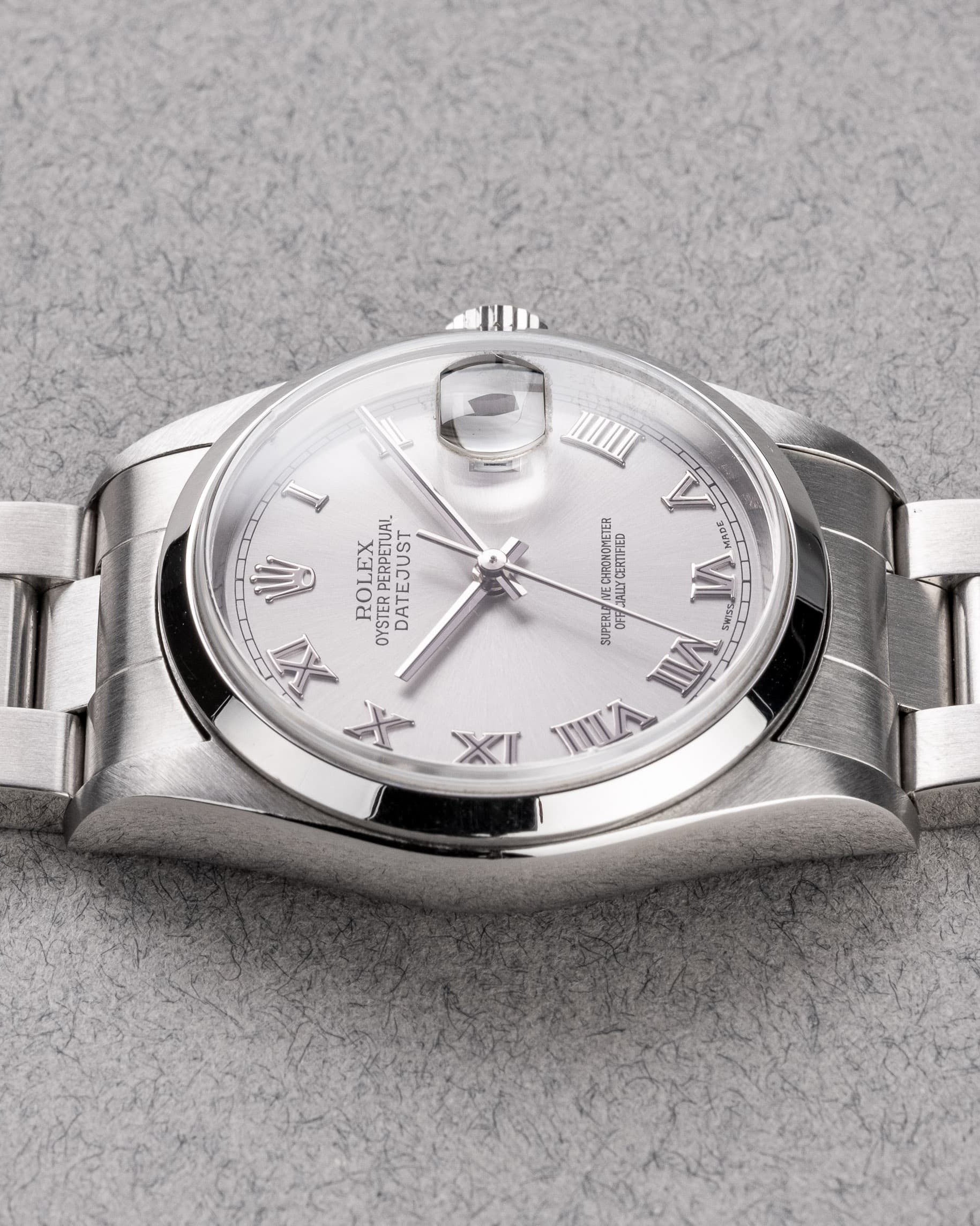 6SCR Rolex Datejust 16200 « Silver Roman » de 2001 avec sa garantie d'origine - Left side