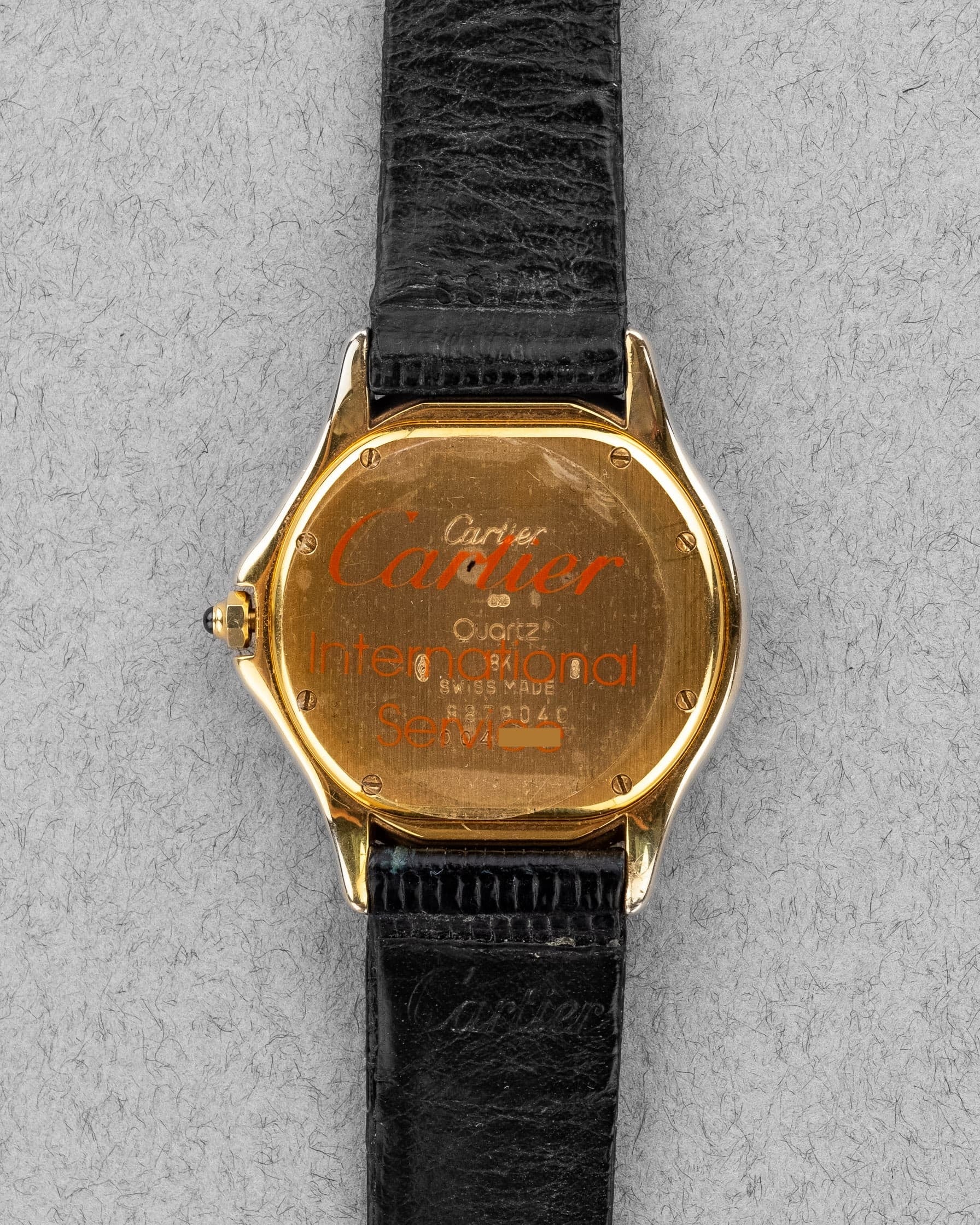 767Y Cartier Cougar 887904C en or jaune - Back