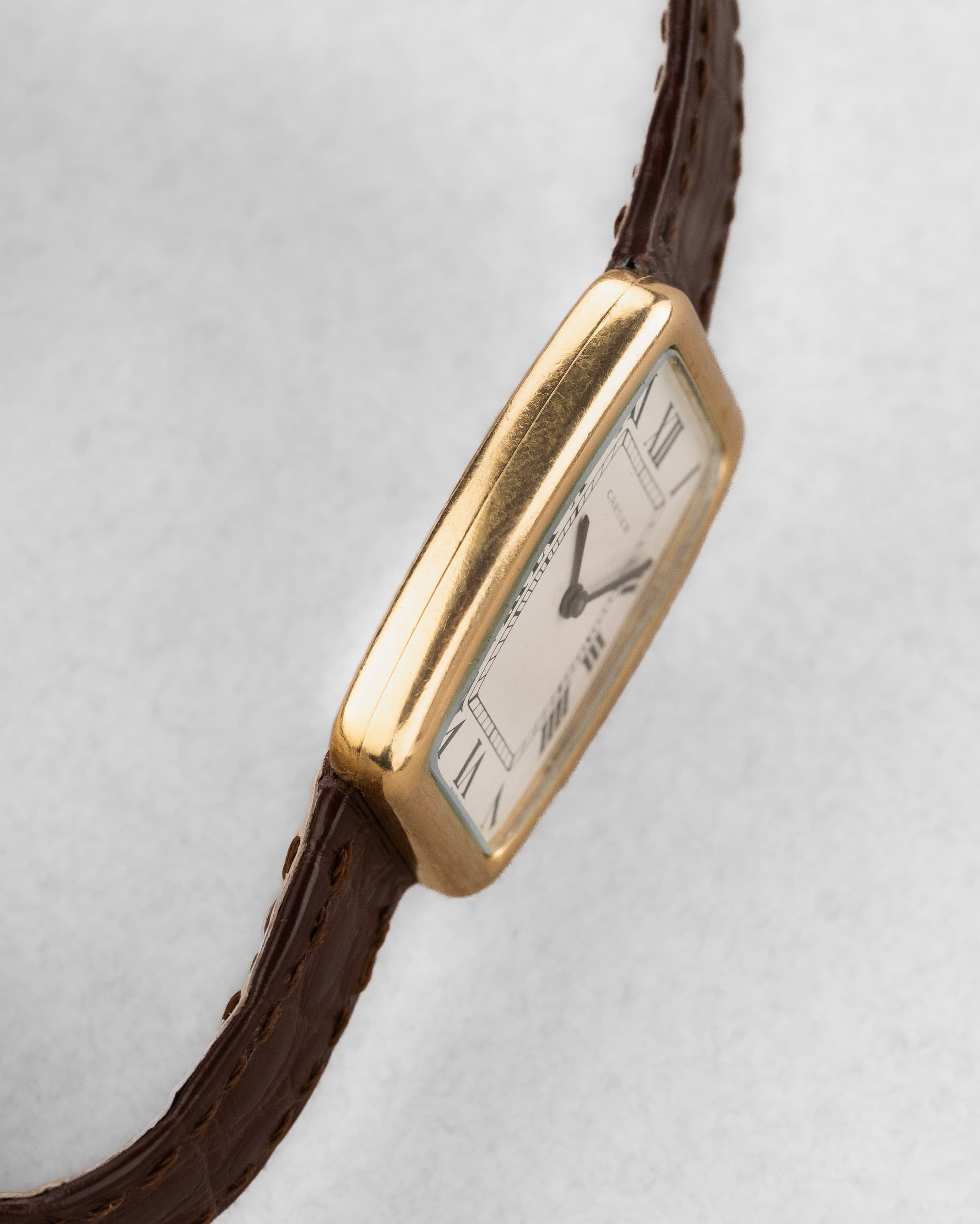 8URX Cartier « Tank Fabergé/Square Incurvée PARIS » réf. 78101 en or jaune, circa 1973 - Left side