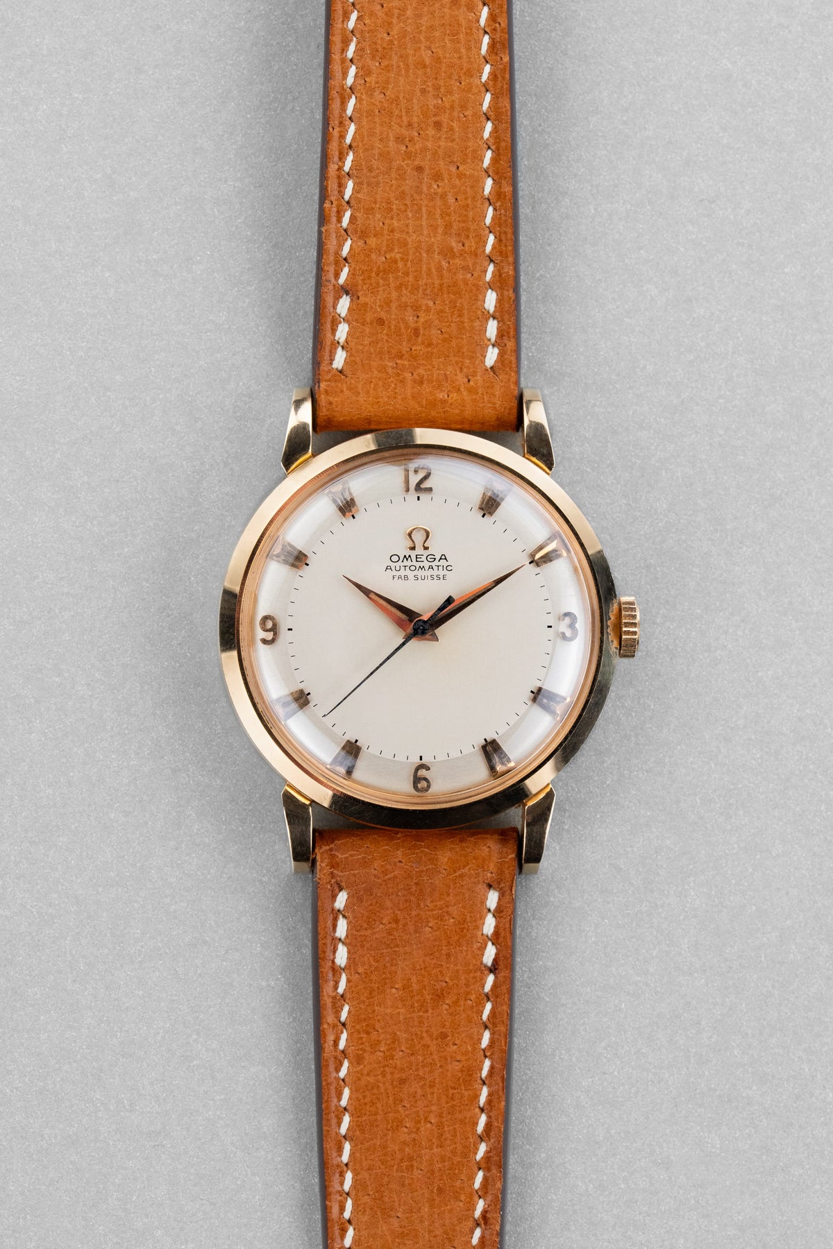 AYSF Superb Omega “Fab. Suisse” Automatic in Rose Gold, circa 1953 – N.O.S. - Front
