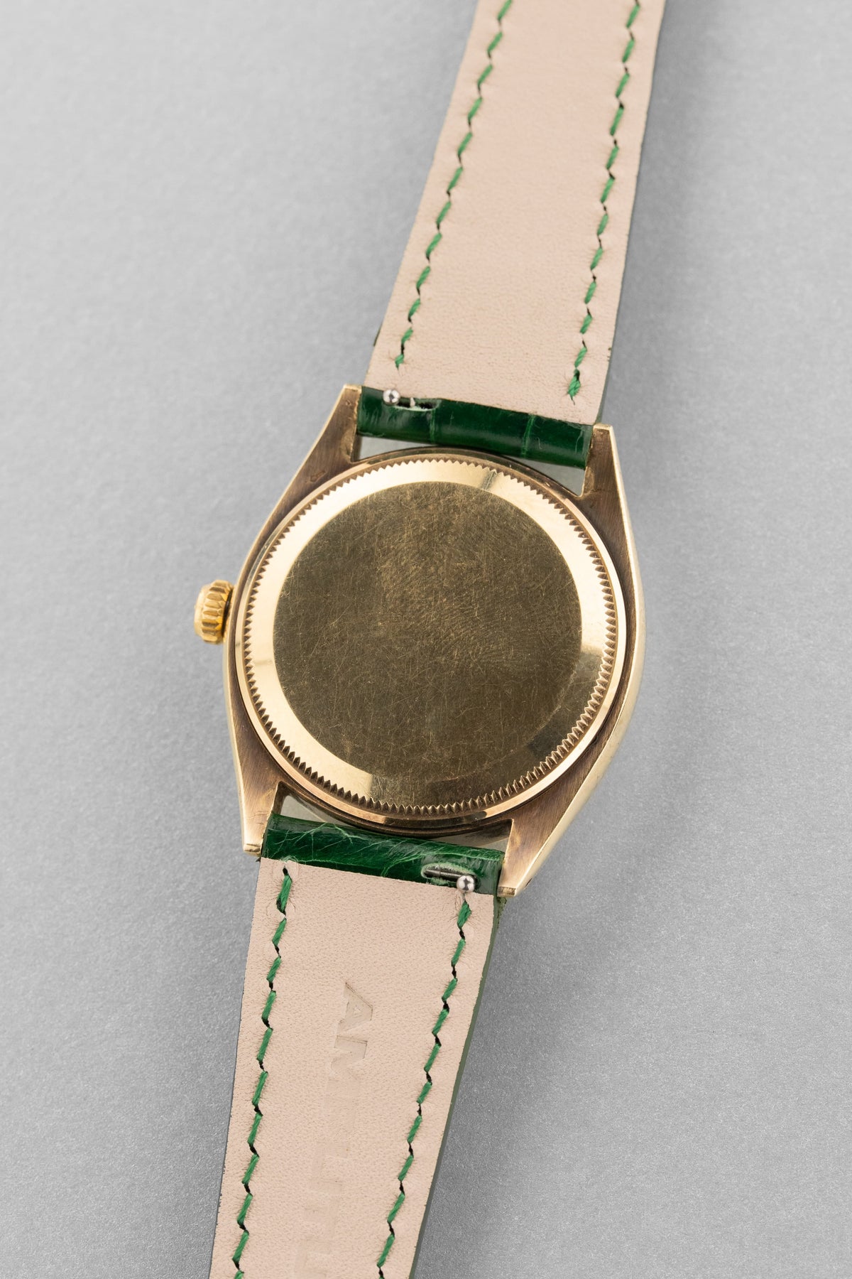 BXFU Rolex Oyster Perpetual 型號 6564 黃金腕錶,1955 年——OCC,英國市場 - 背面