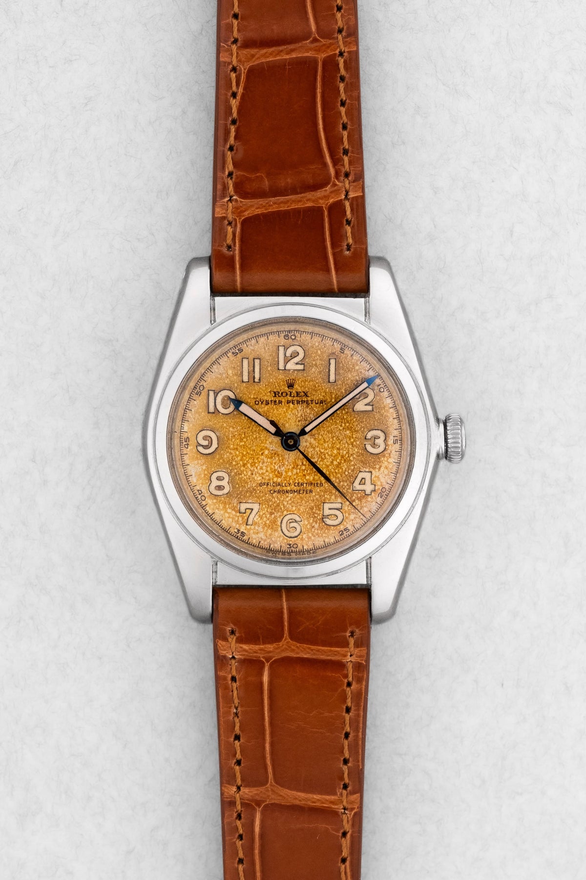 MDLZ Rolex「Bubble Back」型號 5050 不鏽鋼腕錶,1948 年——「Crème Brûlée」Radium Burn 字盤 - 正面