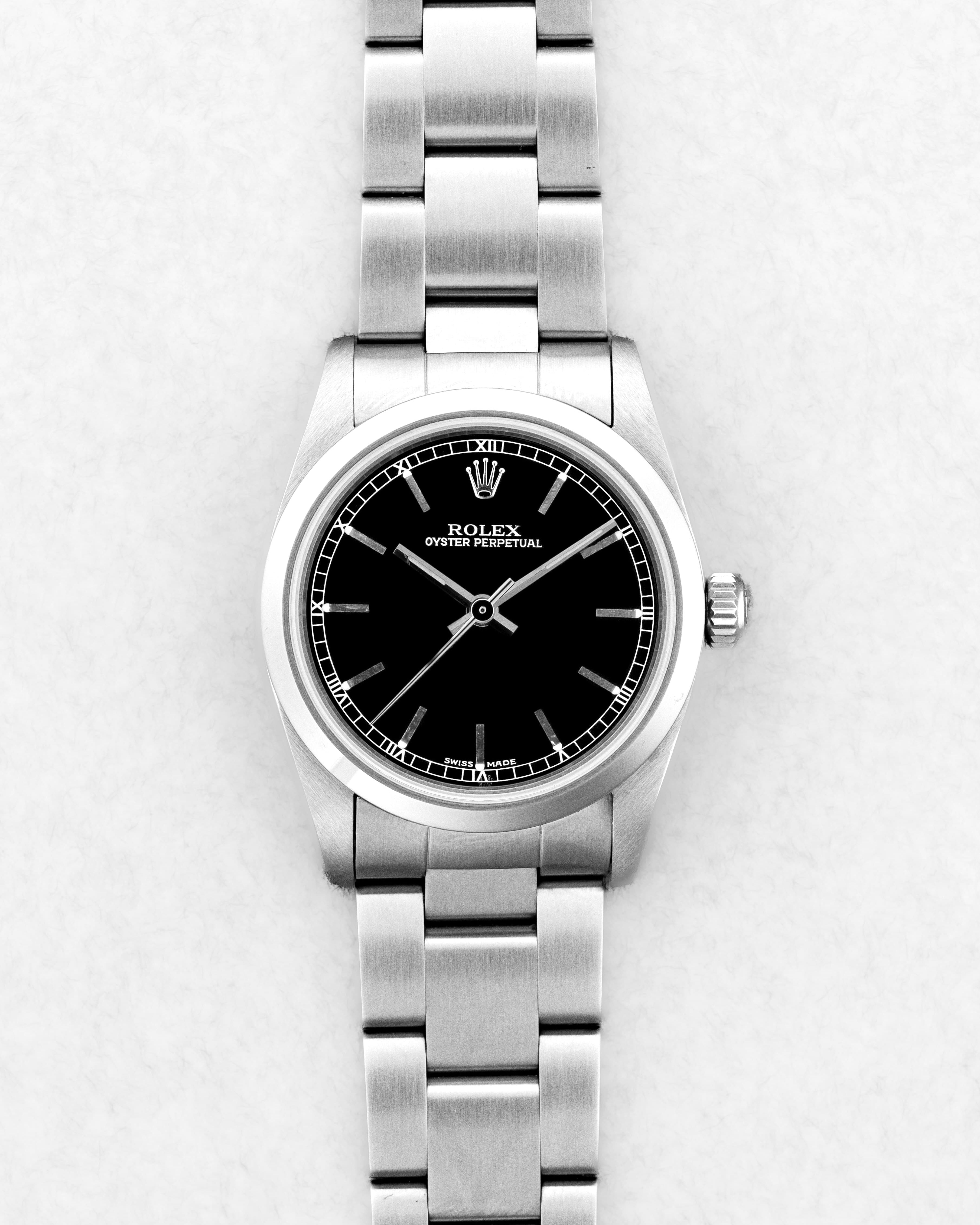 MY8S Rolex Oyster Perpetual 31 réf. 77080 de 2002 – Cadran noir à index bâtons + Full Set - Front