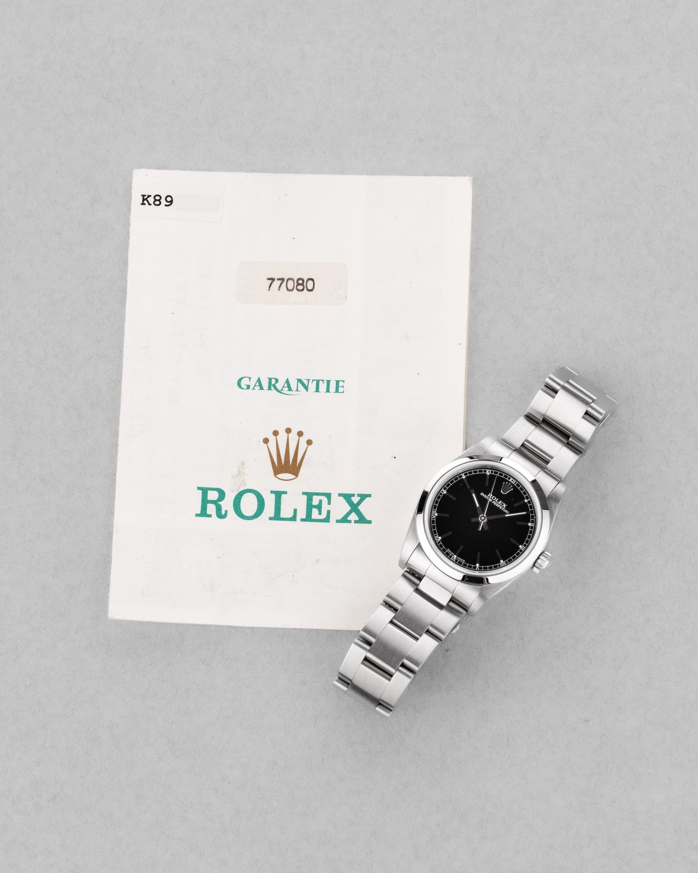 MY8S Rolex Oyster Perpetual 31 réf. 77080 de 2002 – Cadran noir à index bâtons + Full Set - Papers