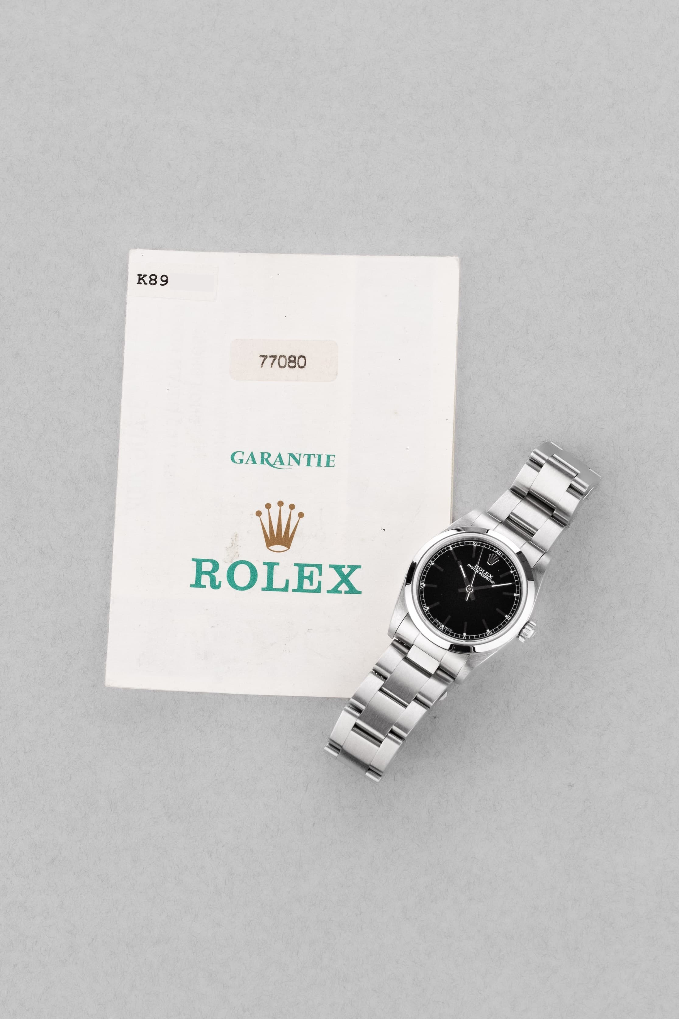 MY8S Rolex Oyster Perpetual 31 réf. 77080 de 2002 – Cadran noir à index bâtons + Full Set - Papers