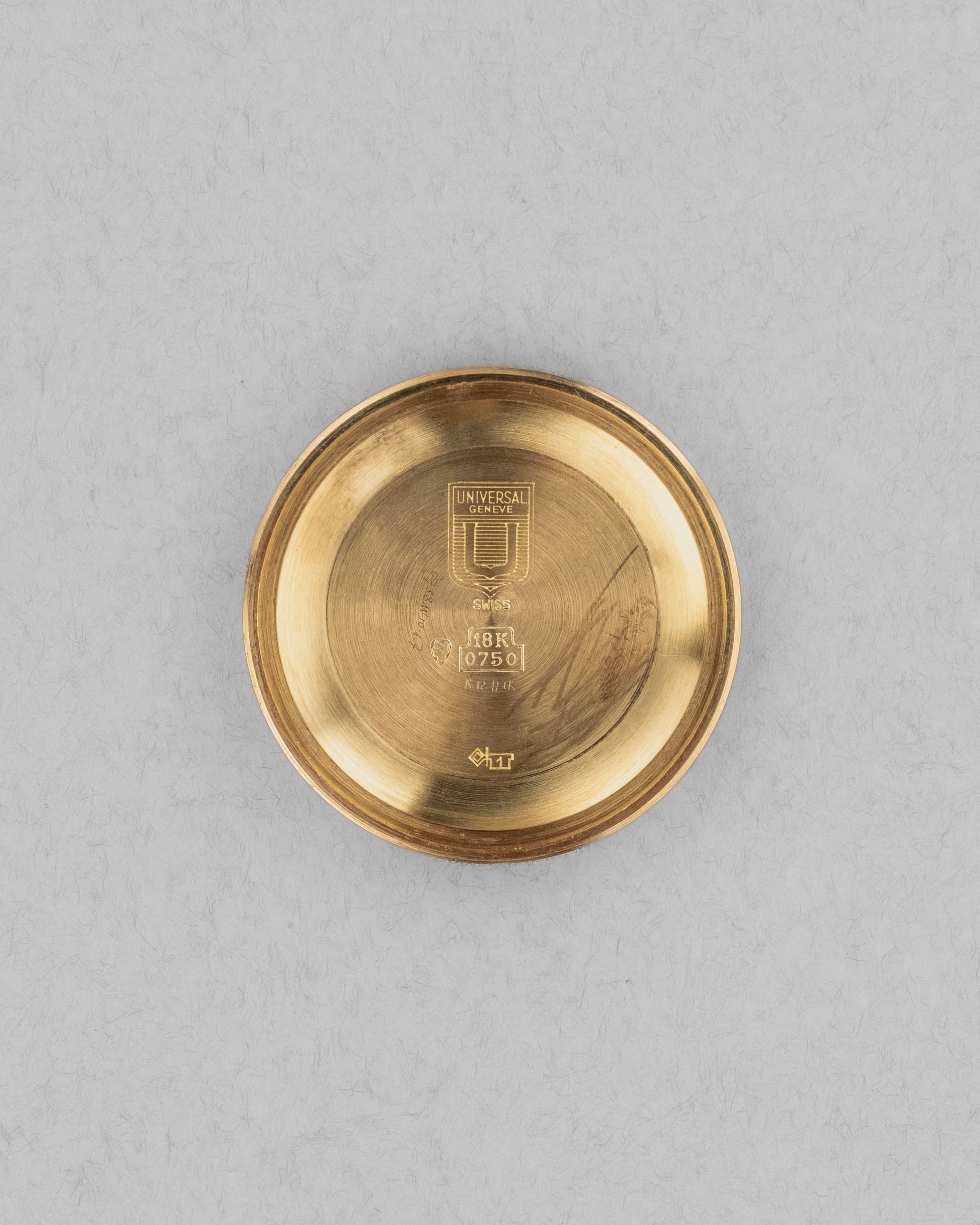 PRUL Superbe Universal Genève Polerouter De Luxe « Caramel Tropical » en or jaune, réf. 10234-3, circa 1955 - Inside case back