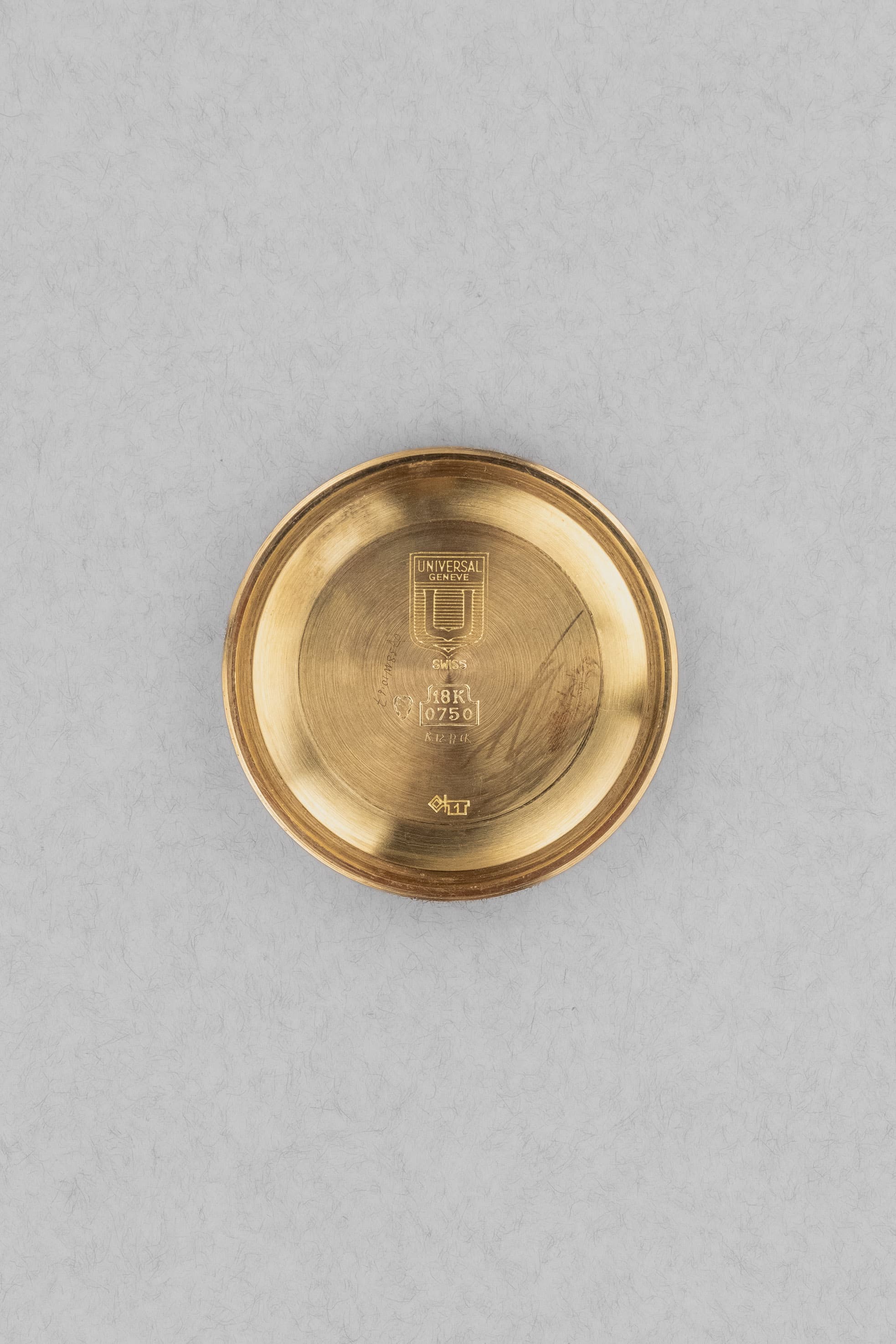 PRUL Superbe Universal Genève Polerouter De Luxe « Caramel Tropical » en or jaune, réf. 10234-3, circa 1955 - Inside case back