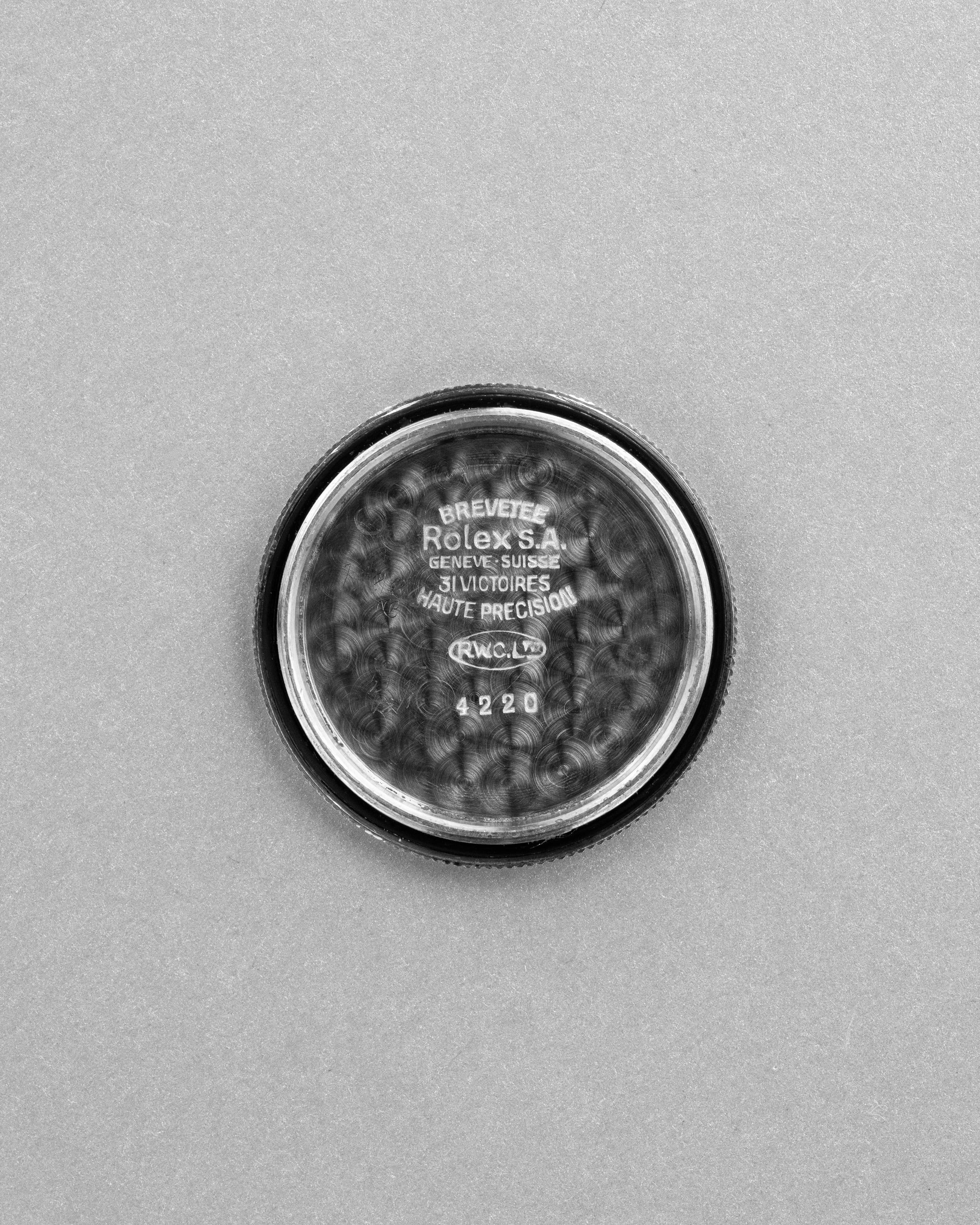 PVZW Superbe et Rare Rolex Speedking réf. 4220 de 1943 – Cadran « Salmon California » au Radium, Flat Back - Inside case back