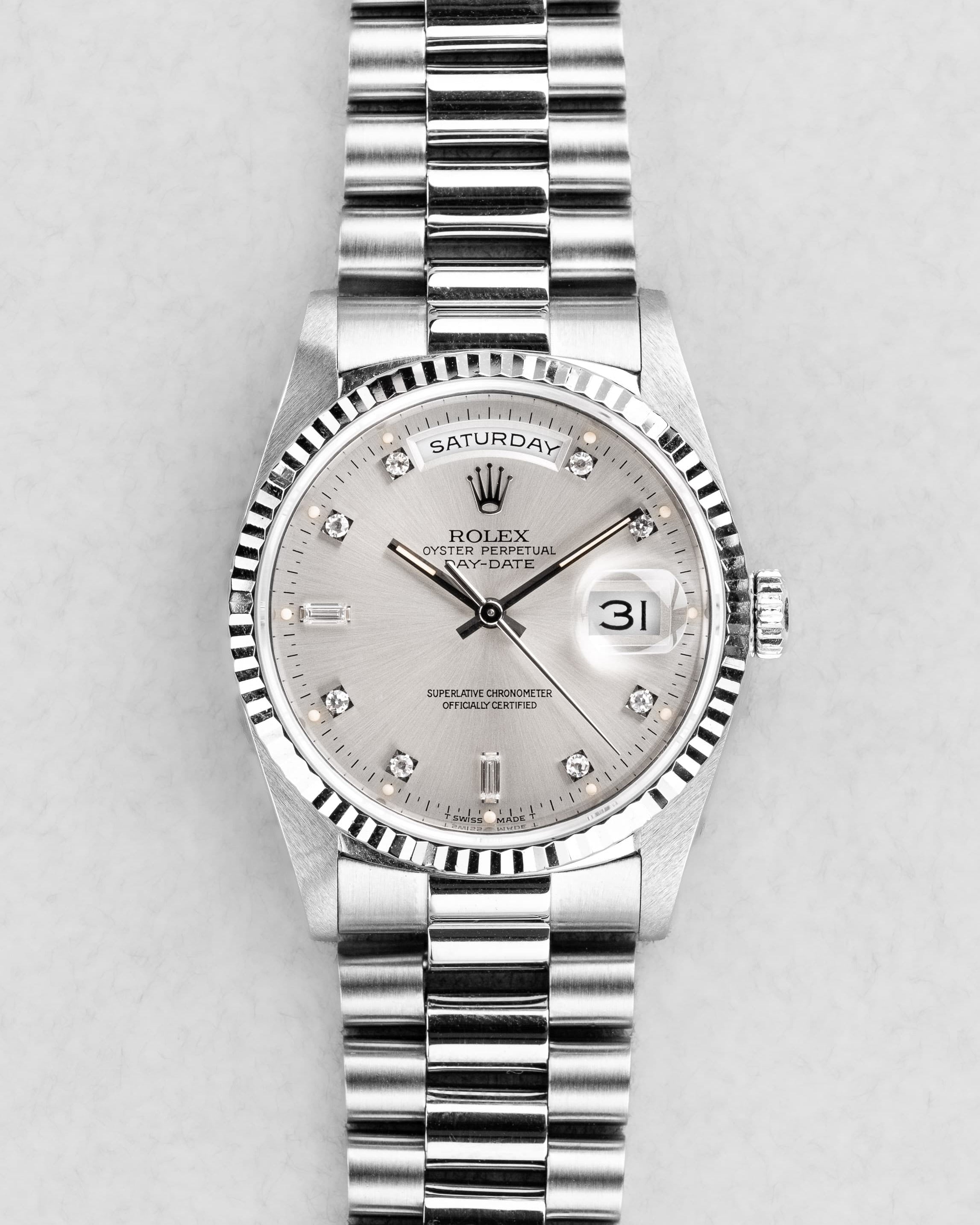 QLZP-cQ Rolex Day-Date réf. 18239A en or blanc et diamants de 1992 – Garantie d'origine Wempe - Front