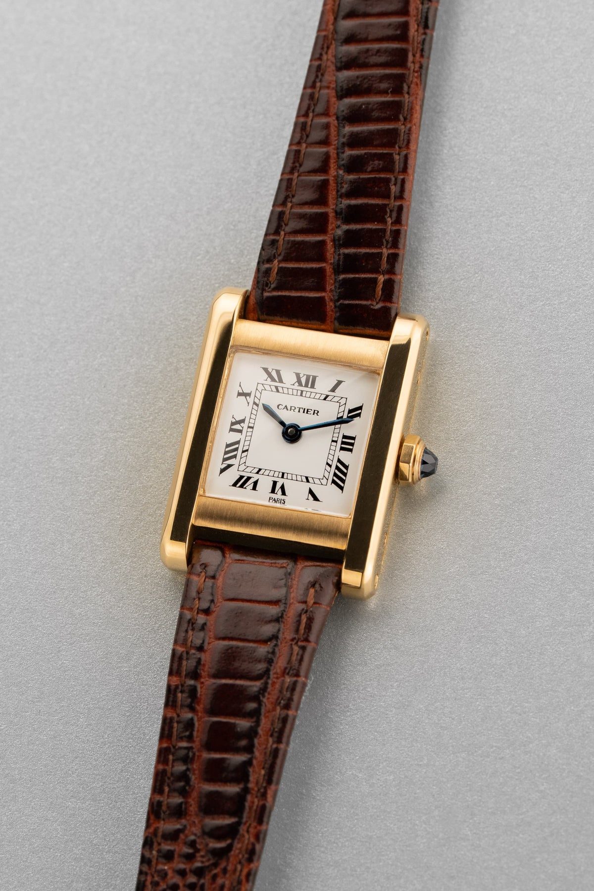 Y2PF Cartier Tank Normale Ref. 78093 in Yellow Gold, circa 1975 – “PARIS” Dial - Three Quarters