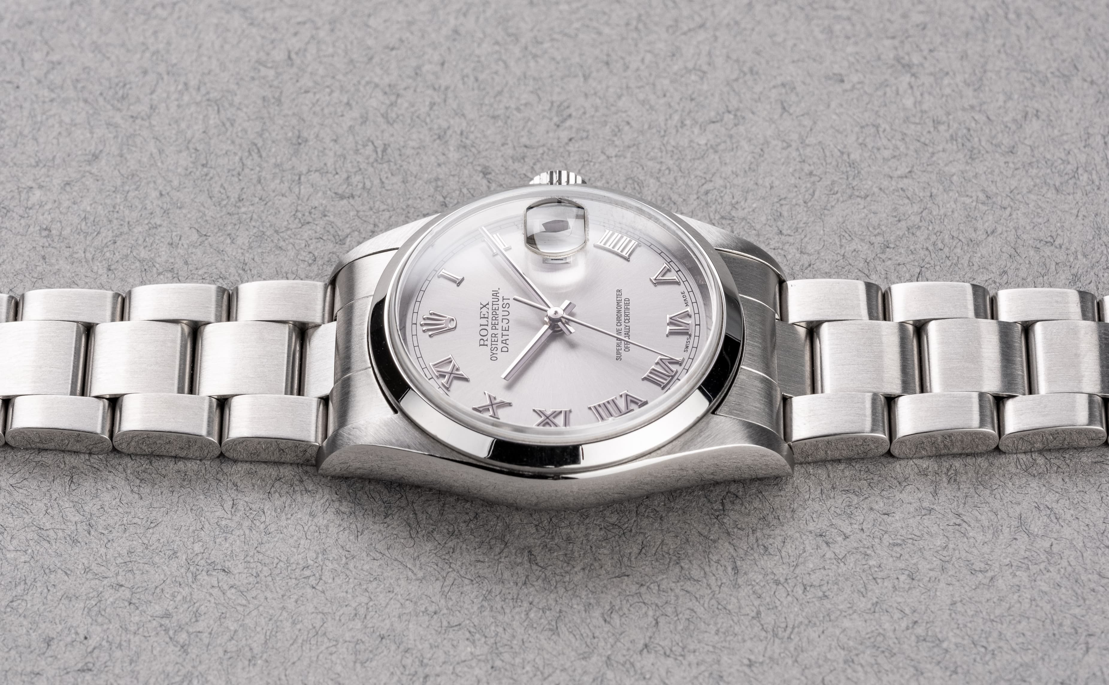 6SCR Rolex Datejust 16200 « Silver Roman » de 2001 avec sa garantie d'origine - Left side