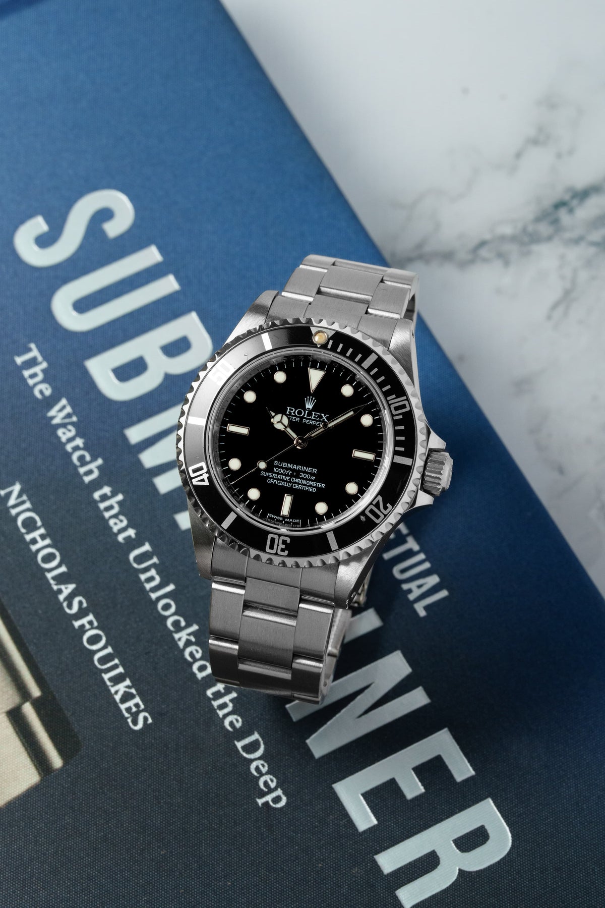 93LD Rolex Submariner 型號 14060M，2009-2010 年——Full Set - 情境照
