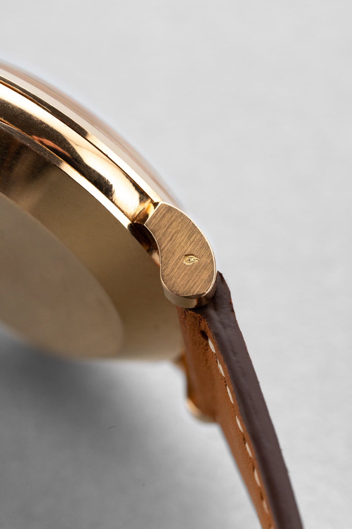 AYSF Superb Omega “Fab. Suisse” Automatic in Rose Gold, circa 1953 – N.O.S. - Left side