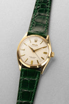 BXFU Rolex Oyster Perpetual 型號 6564 黃金腕錶，1955 年——OCC，英國市場 - 四分之三視角