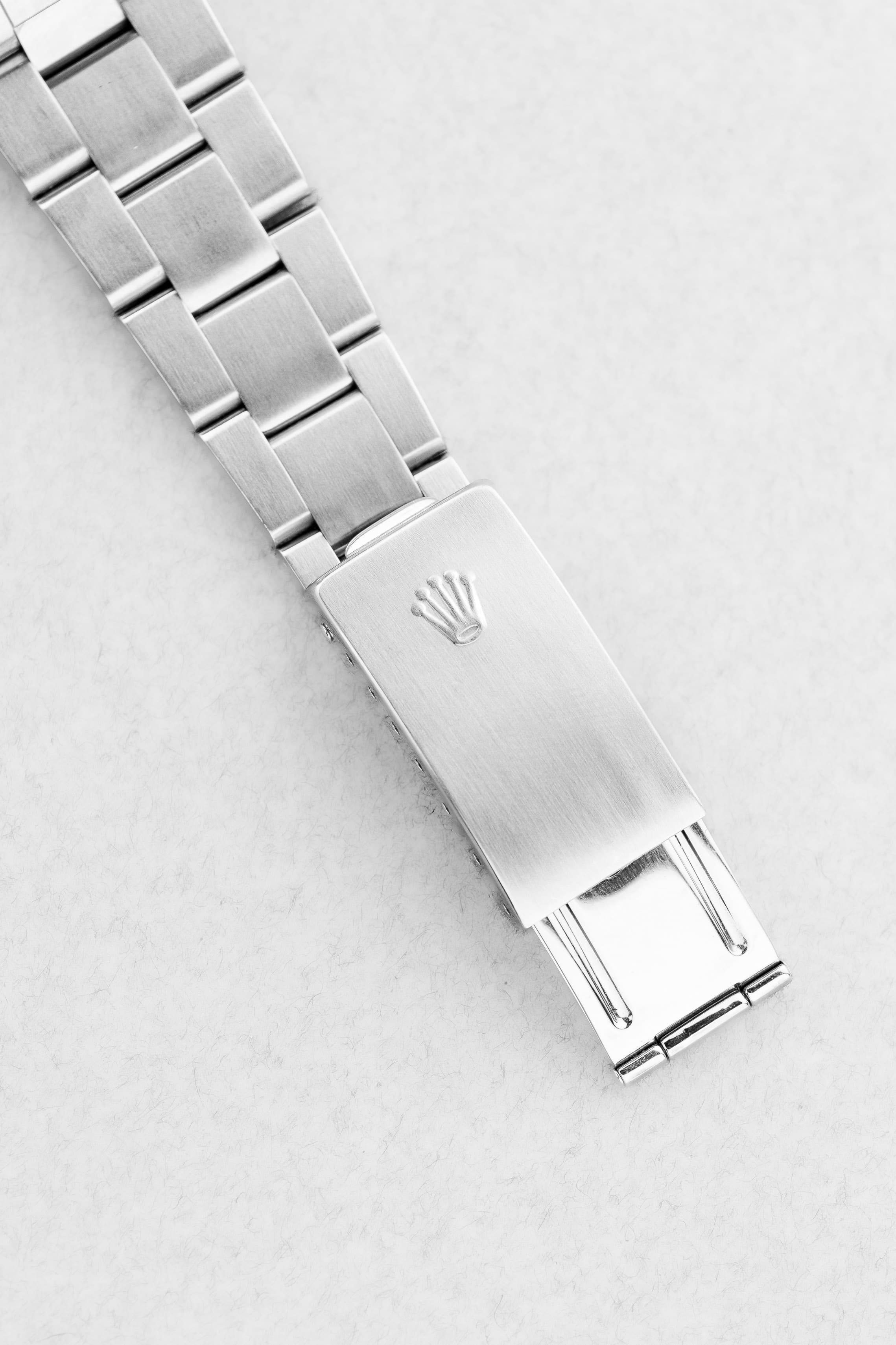 DT2Y Rolex Oyster Perpetual Date 15200 de 1999 – Cadran noir au tritium patiné - Buckle Outside