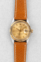 LT2H Rolex Datejust 1601 « Champagne Wide Boy Sigma » de 1974 en or et acier - Front