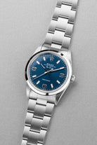 LYH7 Rolex Air-King ref. 14000M del 2006 – Quadrante blu « Explorer 3-6-9 » e Garanzia Rolex - Tre quarti