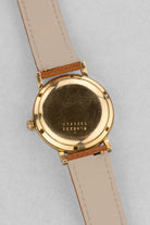 PRUL Superbe Universal Genève Polerouter De Luxe « Caramel Tropical » en or jaune, réf. 10234-3, circa 1955 - Back