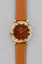 PRUL Superbe Universal Genève Polerouter De Luxe « Caramel Tropical » en or jaune, réf. 10234-3, circa 1955 - Front