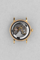 PRUL Superbe Universal Genève Polerouter De Luxe « Caramel Tropical » en or jaune, réf. 10234-3, circa 1955 - Movement