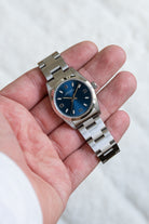 SGNE 1997 Rolex Oyster Perpetual 31 Ref. 67480 – Blue “Explorer 3-6-9” Dial, Original Warranty, Perfect Condition - Lifestyle