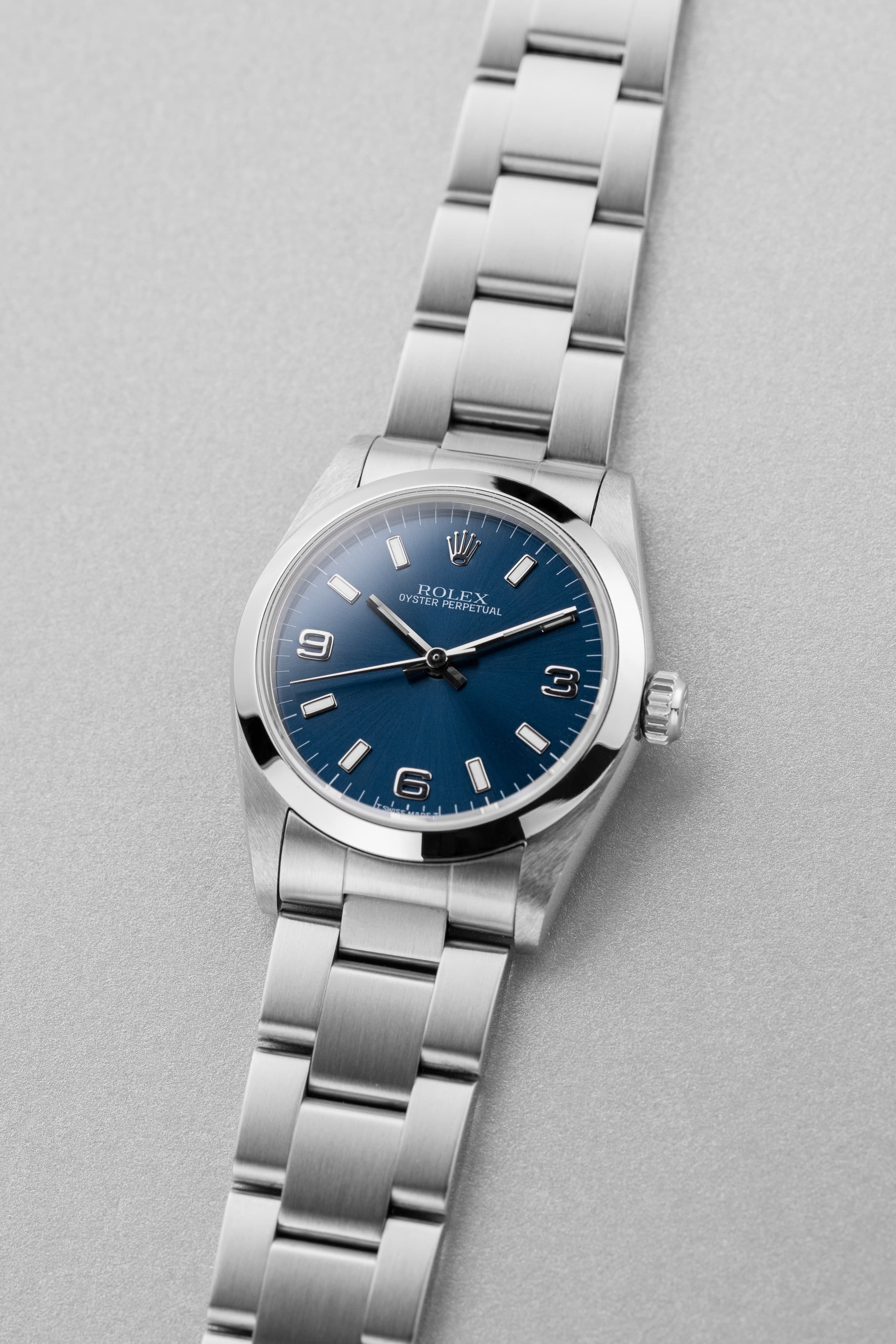 SGNE Rolex Oyster Perpetual 31 ref. 67480 1997 г. — синий циферблат «Explorer 3-6-9», оригинальная гарантия, идеальное состояние - Три четверти