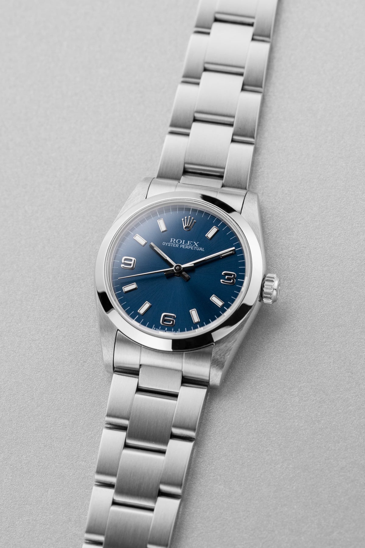 SGNE 1997 Rolex Oyster Perpetual 31 Ref. 67480 – Blue “Explorer 3-6-9” Dial, Original Warranty, Perfect Condition - Three Quarters