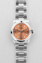 SUK2 Rolex Oyster Perpetual 31 réf. 67480 de 1997-1998 – Garantie Rolex d’origine + Cadran rose/saumon « Explorer 3-6-9 » - Front