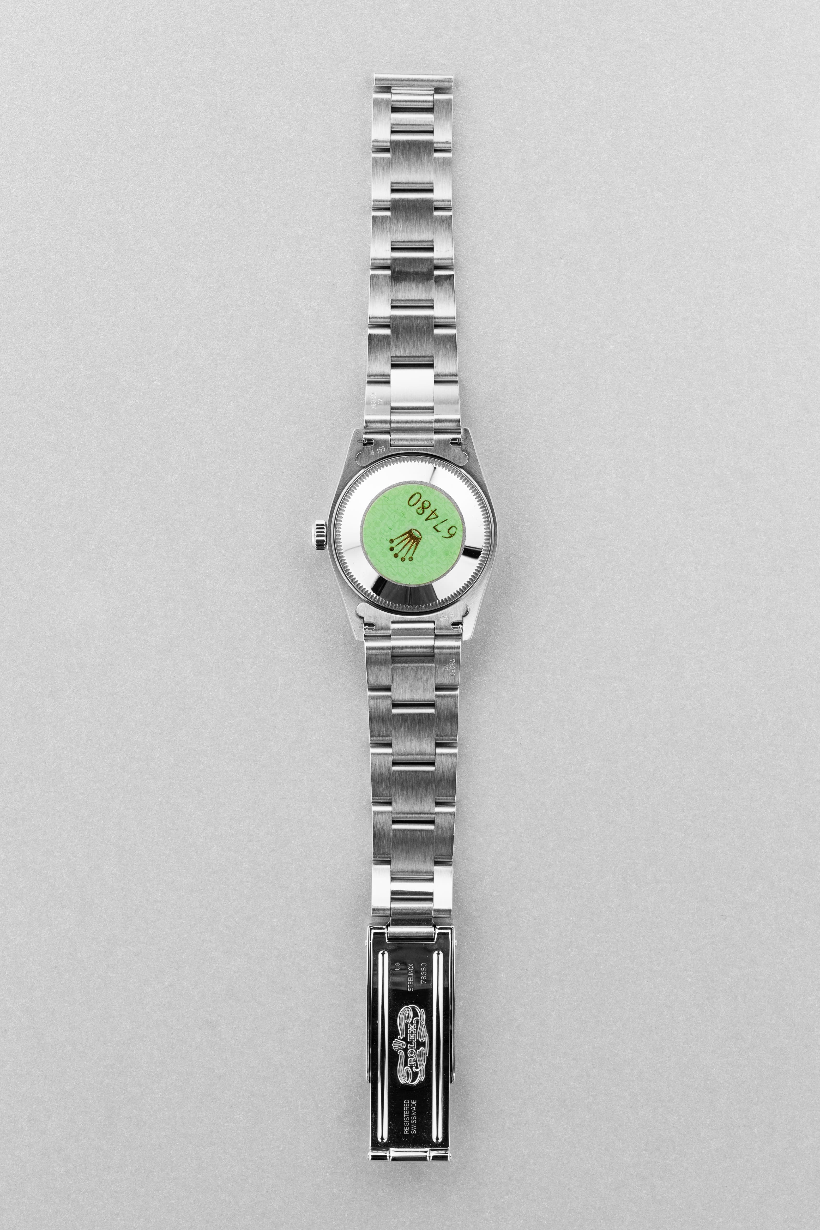 SUK2 Rolex Oyster Perpetual 31 réf. 67480 de 1997-1998 – Garantie Rolex d’origine + Cadran rose/saumon « Explorer 3-6-9 » - Overview