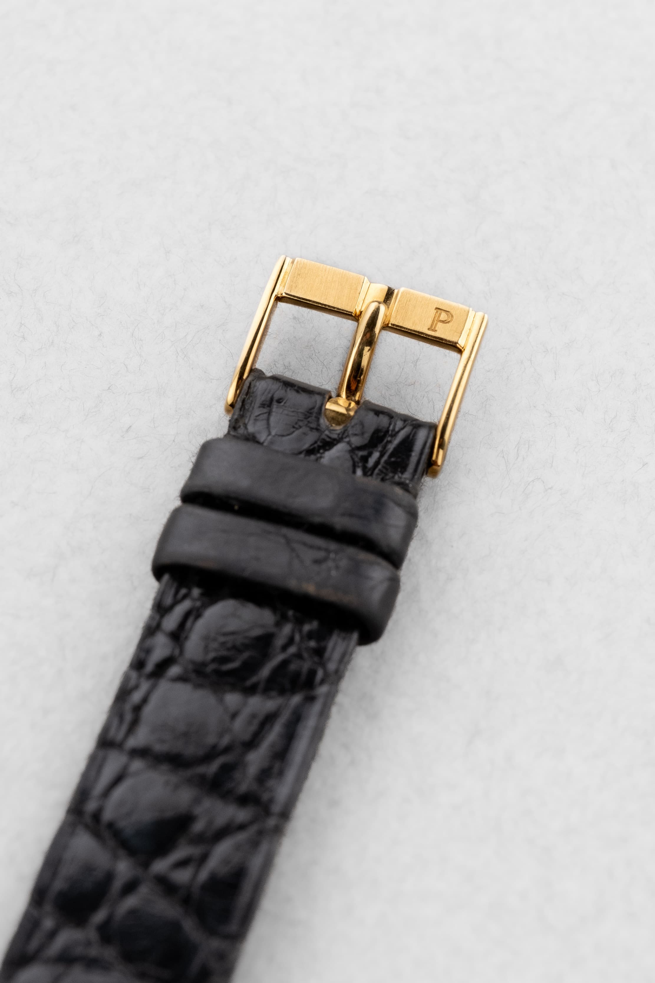 UQYY Piaget Polo « Medium » de 1ère génération en or jaune et cadran en Onyx noir, réf. 8673, circa 1980 - Buckle Outside